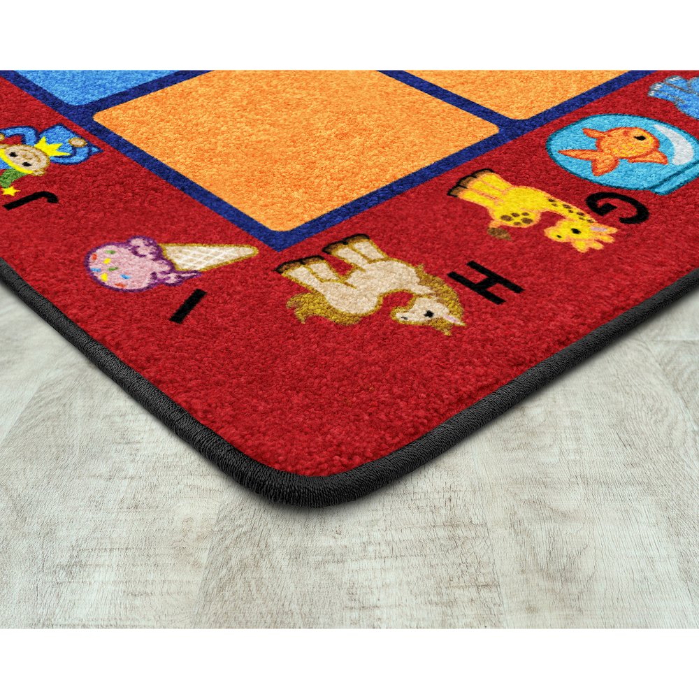Kid Essentials Alphabet Phonics 7'8" x 10'9" Area Rug in Color Red