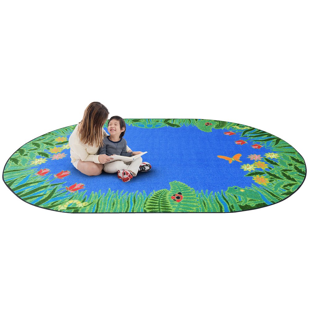 Kid Essentials Merry Meadows 10'9" x 13'2" Oval Area Rug in Color Blue