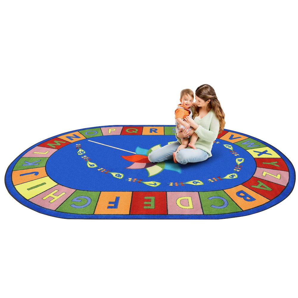 Kid Essentials Alphabet Pinwheel 7'8" x 10'9" Oval Area Rug in Color Multi
