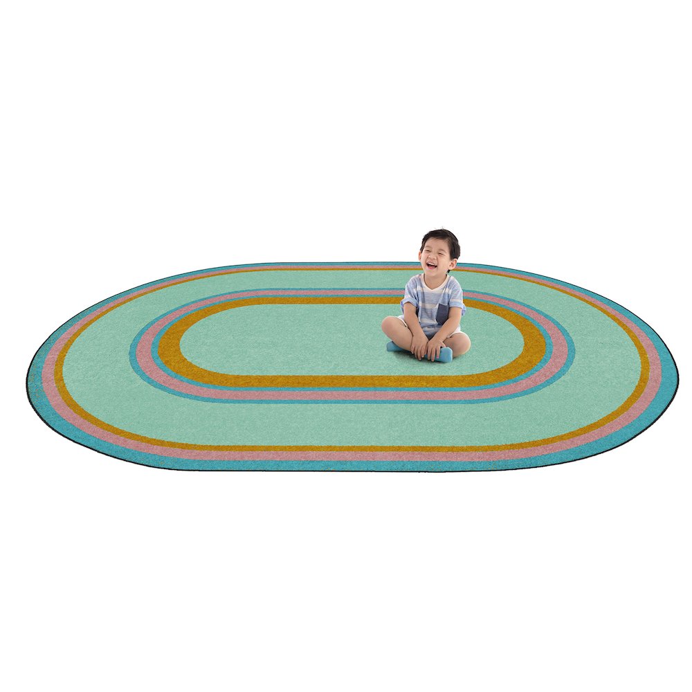 Kid Essentials Ripples 5'4" x 7'8" Oval Area Rug in Color Teal