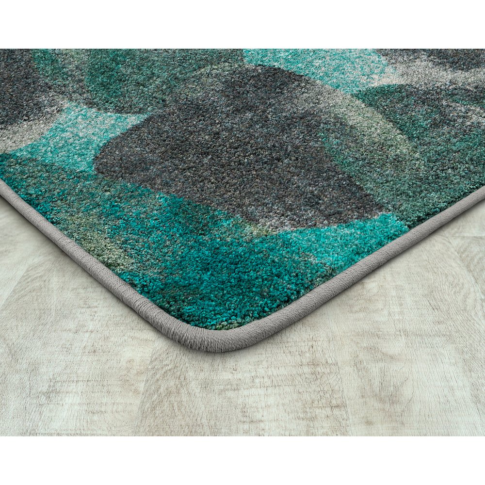 Kid Essentials Riverstone 7'8" x 10'9" Area Rug in Color Teal
