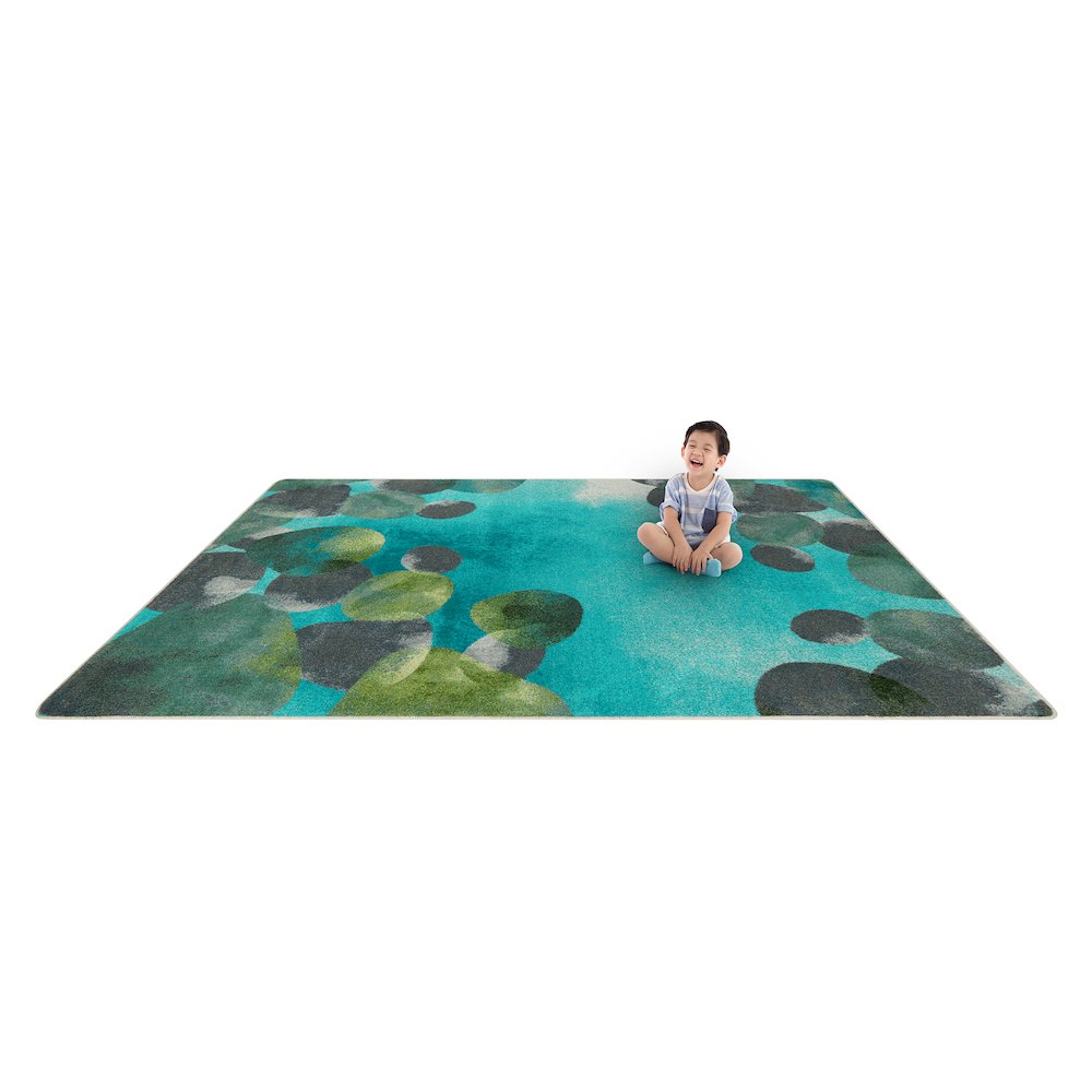 Kid Essentials Riverstone 7'8" x 10'9" Area Rug in Color Teal