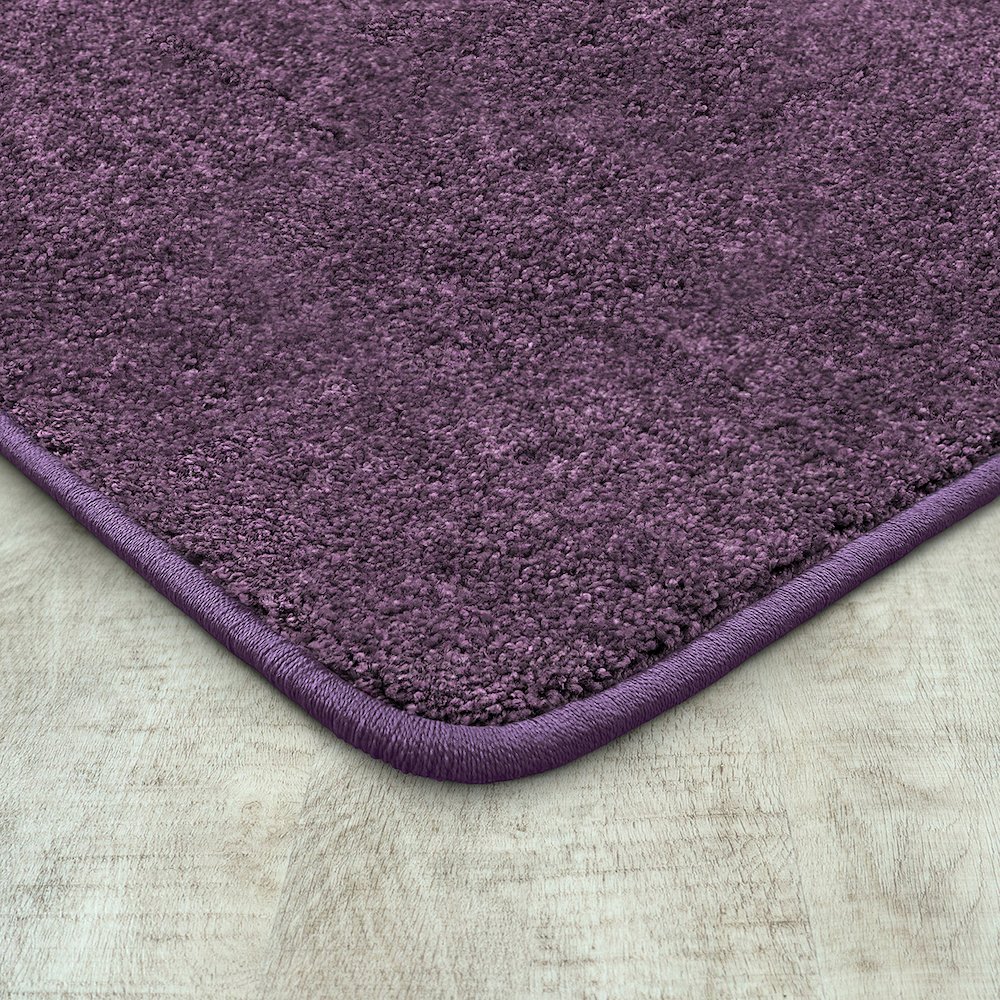 Kid Essentials Endurance 6' x 9' Area Rug in Color Purple
