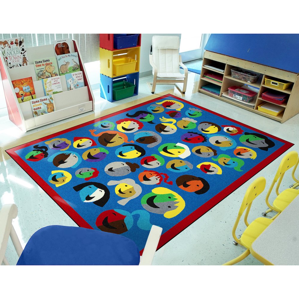 Kid Essentials Joyful Faces 7'8" x 10'9" Area Rug in Color Blue