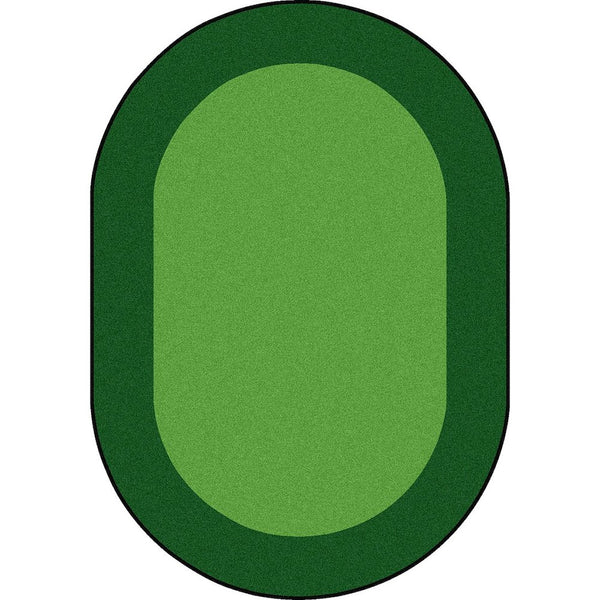 Kid Essentials All Around 5'4" x 7'8" Oval Area Rug in Color Green