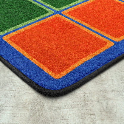 Kid Essentials Blocks Abound 5'4" x 7'8" Area Rug in Color Primary