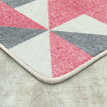 Claremont Kids Cartwheel 3'10" x 5'4" Area Rug in Color Blush