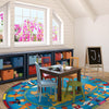 Kid Essentials Hands Around the World 5'4" x 7'8" Oval Area Rug in Color Multi