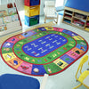Kid Essentials LenguaLink (Spanish) 5'4" x 7'8" Oval Area Rug in Color Multi