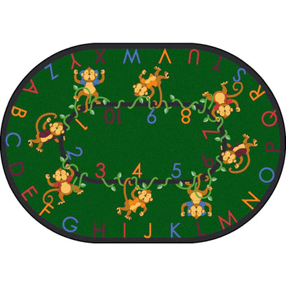 Kid Essentials Monkey Business 5'4" x 7'8" Oval Area Rug in Color Green
