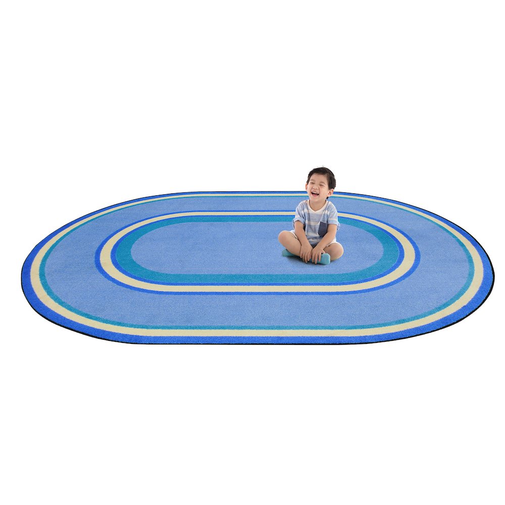 Kid Essentials Ripples 3'10" x 5'4" Oval Area Rug in Color Boy Blue