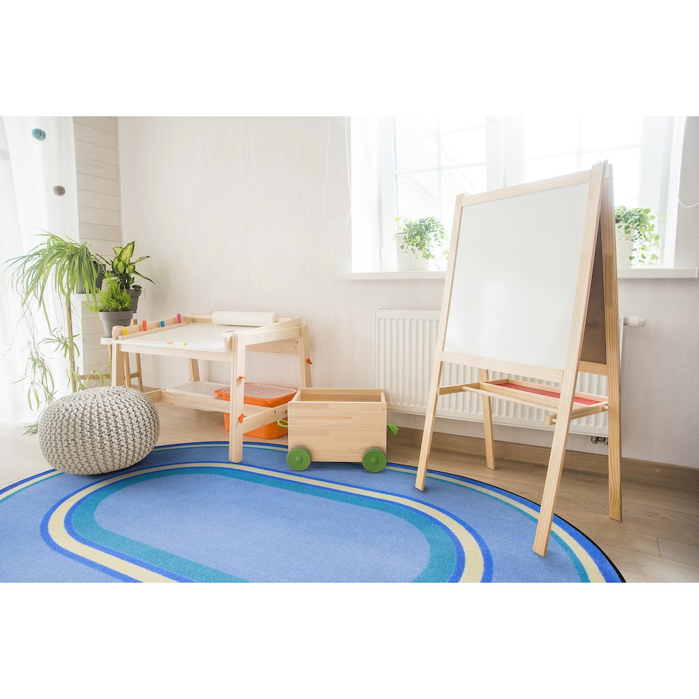 Kid Essentials Ripples 3'10" x 5'4" Oval Area Rug in Color Boy Blue