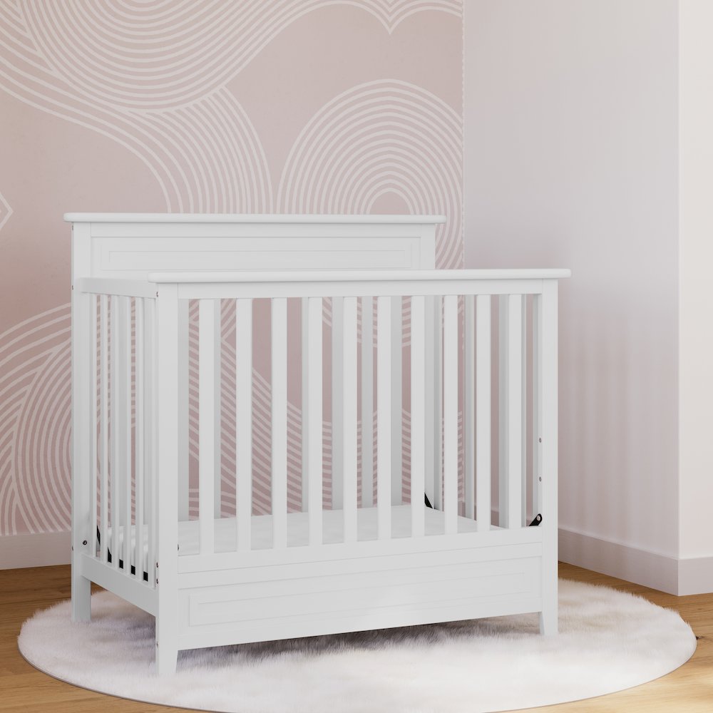 Storkcraft Petal 4-in-1 Convertible Mini Crib, White