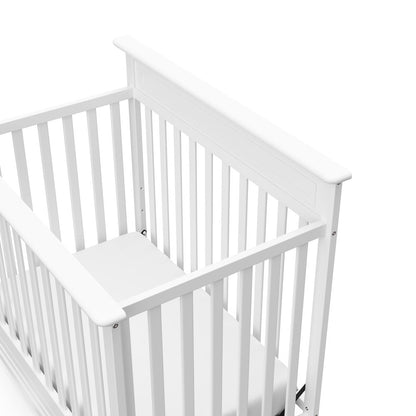 Storkcraft Petal 4-in-1 Convertible Mini Crib, White